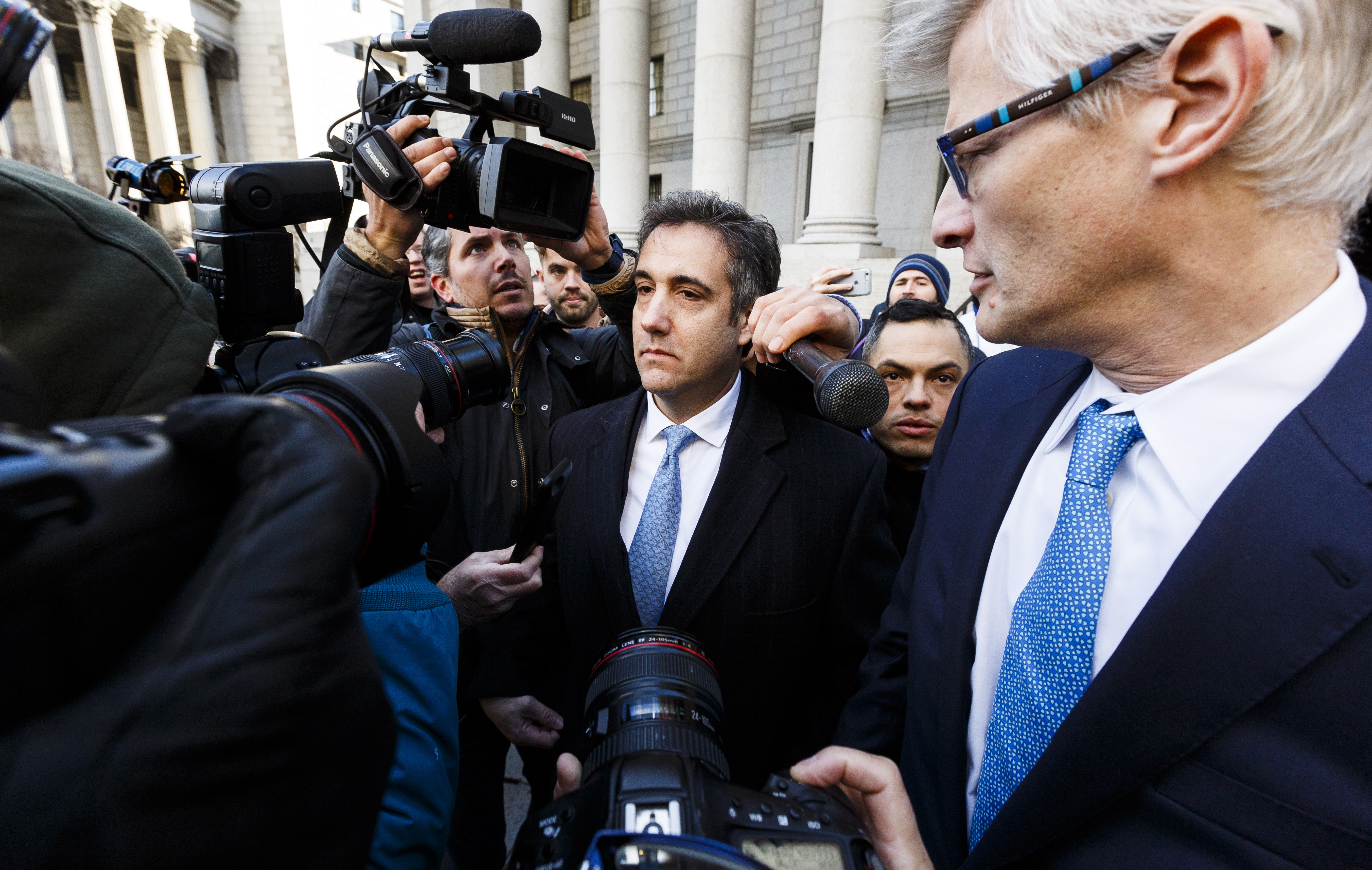 epa07197361 Michael Cohen (C), US President Donald Trump's former personal lawyer, leaves federal court after pleading guilty to charges related to lying to congress in New York, New York, USA, on 29 November 2018.  EPA/JUSTIN LANE