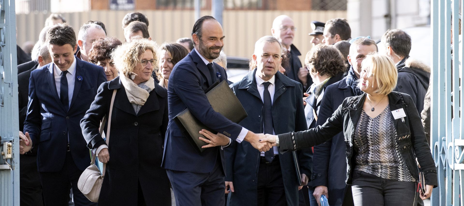 epa07147797 French Prime Minister Edouard Philippe (C)  arrives at the prefecture for a cabinet meeting in Charleville-Mezieres, northeastern France, 07 November 2018, as part of a World War One commemoration tour. French President Macron started a week of commemorations for the 100th anniversary of the end of World War One, which is set to mix remembrance of the past and warnings about the present surge in nationalism around the globe.  EPA/ETIENNE LAURENT