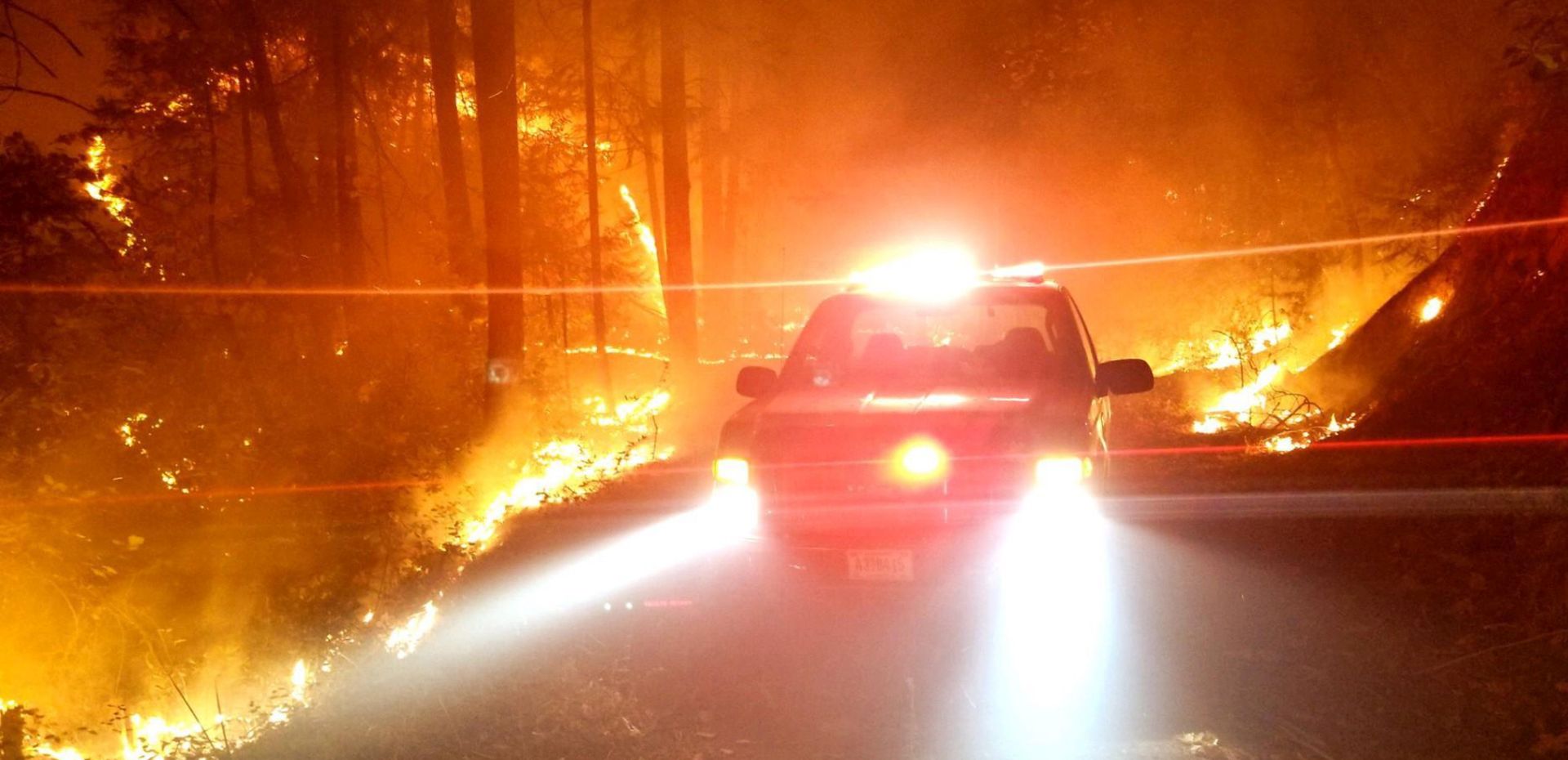 epa07179382 An undated handout photo made available by the United States Forest Service (USFS) and the National Wildfire Coordinating Group (NWCG) on Inciweb on 20 November 2018 shows firefighters battling the Camp Fire in Northern California, USA. The death toll from the Camp Fire increased to 79 on 19 November 2018, as the blaze destroyed thousands of homes. Officials said that around 1,000 people are missing and unaccounted for. The fire, the deadliest and most destructive wildfire in the state's history, has scorched as of 20 November 2018, some 151,000 acres and has been 70 percent contained.  EPA/USFS/NWCG HANDOUT -- BEST QUALITY AVAILABLE -- HANDOUT EDITORIAL USE ONLY