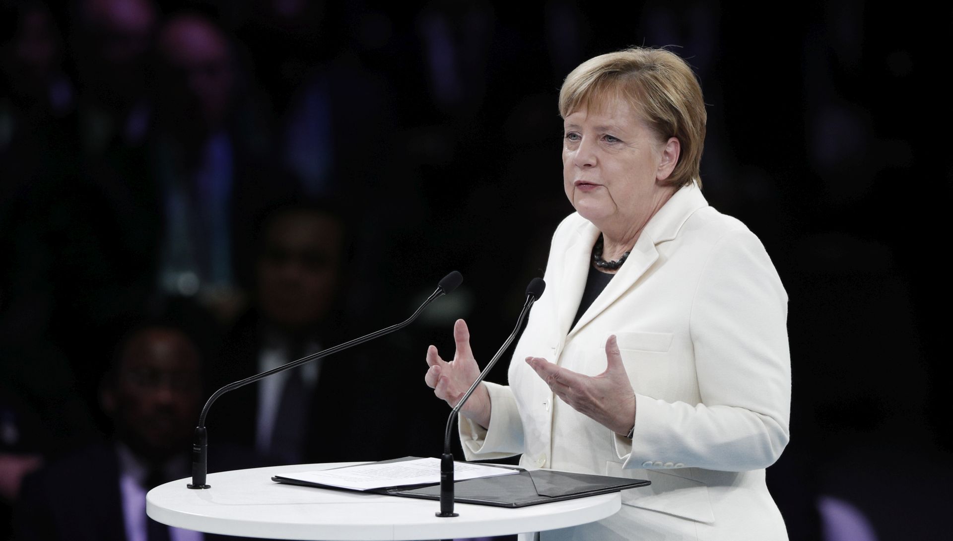 epa07158877 German Chancellor Angela Merkel delivers a speech at the opening session of the Paris Peace Forum as part of the international commemoration ceremony for the Centenary of the WWI Armistice of 11 November 1918, in Paris, France, 11 November 2018. World leaders have gathered in France to mark the 100th anniversary of the First World War Armistice with services taking place across the world to commemorate the occasion.  EPA/YOAN VALAT / POOL