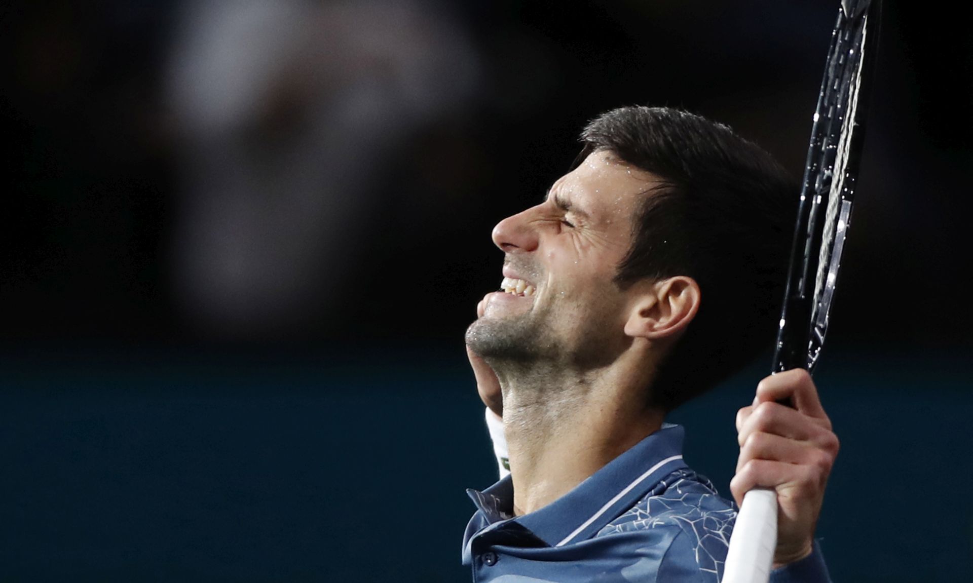 epa07137750 Novak Djokovic of Serbia celebrates winning his quarter final match against Marin Cilic of Croatia at the Rolex Paris Masters tennis tournament in Paris, France, 02 November 2018.  EPA/IAN LANGSDON