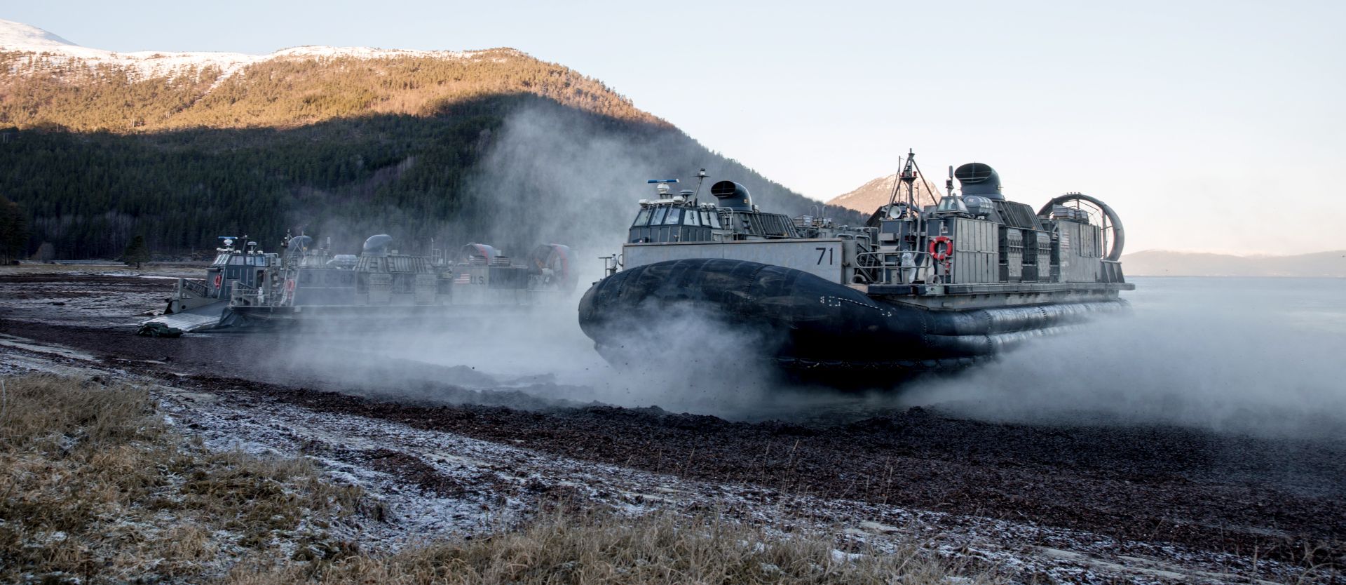 epa07129483 A handout photo made available by the Norwegian Armed Forces on 29 October 2018 shows  Amphibious vehicles from the US Marine Corps put in land personnel and equipment during the NATO-led military excercise Trident Juncture 2018 in in Alvund, Norway, 29 October 2018. According to reports, some 50,000 participants from over 30 nations are expected to take part in the NATO-led military exercise in Norway from 25 October to 23 November 2018.  EPA/Jakob Ostheim / Forsvaret HANDOUT  HANDOUT EDITORIAL USE ONLY/NO SALES *** Local Caption *** Personell from the US Marine Corps conducting an amphibious landing of personell and vehicles in Ã…lvund, Norway during exercise Trident Juncture 2018