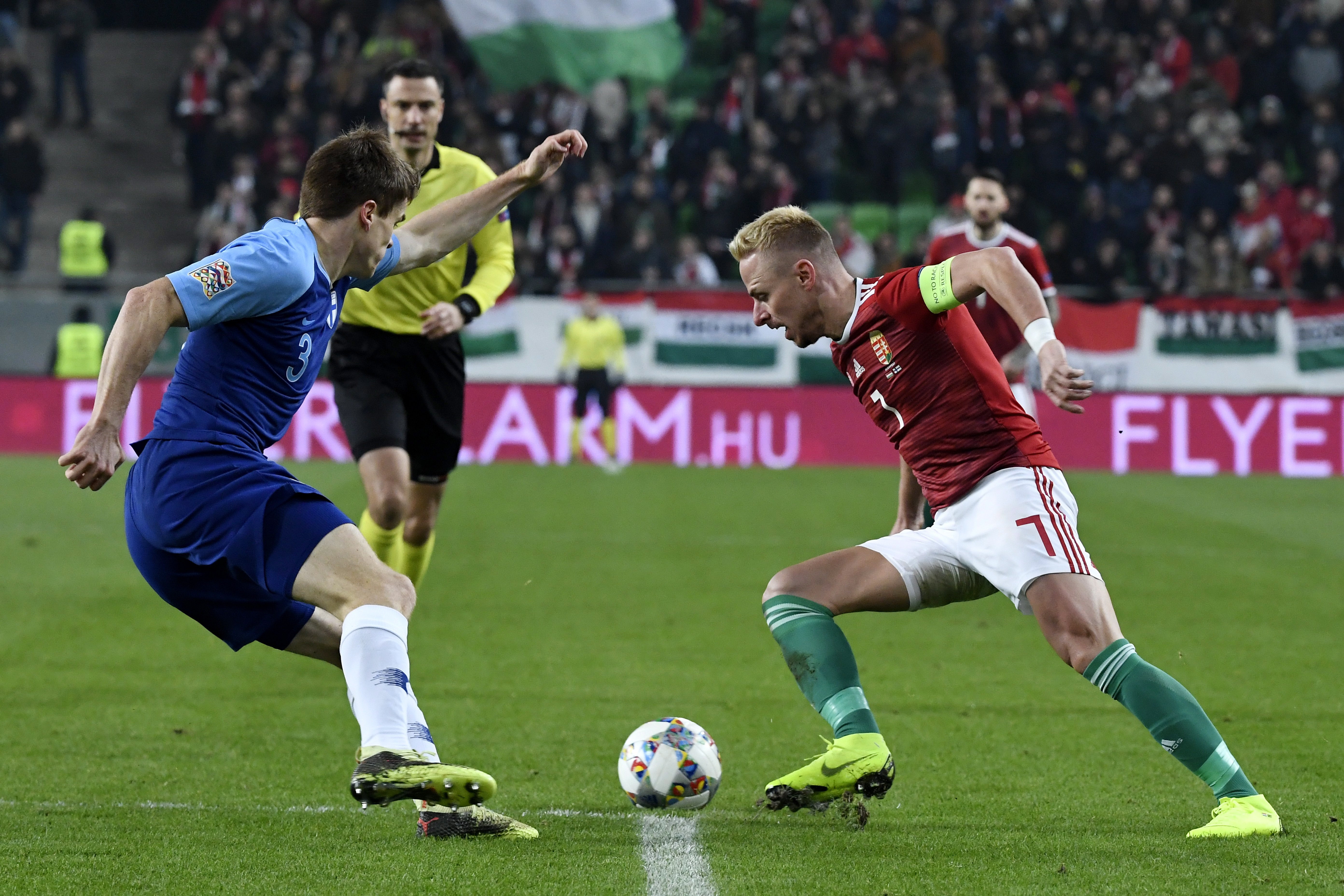epa07175897 Albin Granlund (L) of Finland challenges Balazs Dzsudzsak of Hungary for the ball during the soccer UEFA Nations League match Hungary vs. Finland in Budapest, Hungary, 18 November 2018.  EPA/Szilard Koszticsak HUNGARY OUT