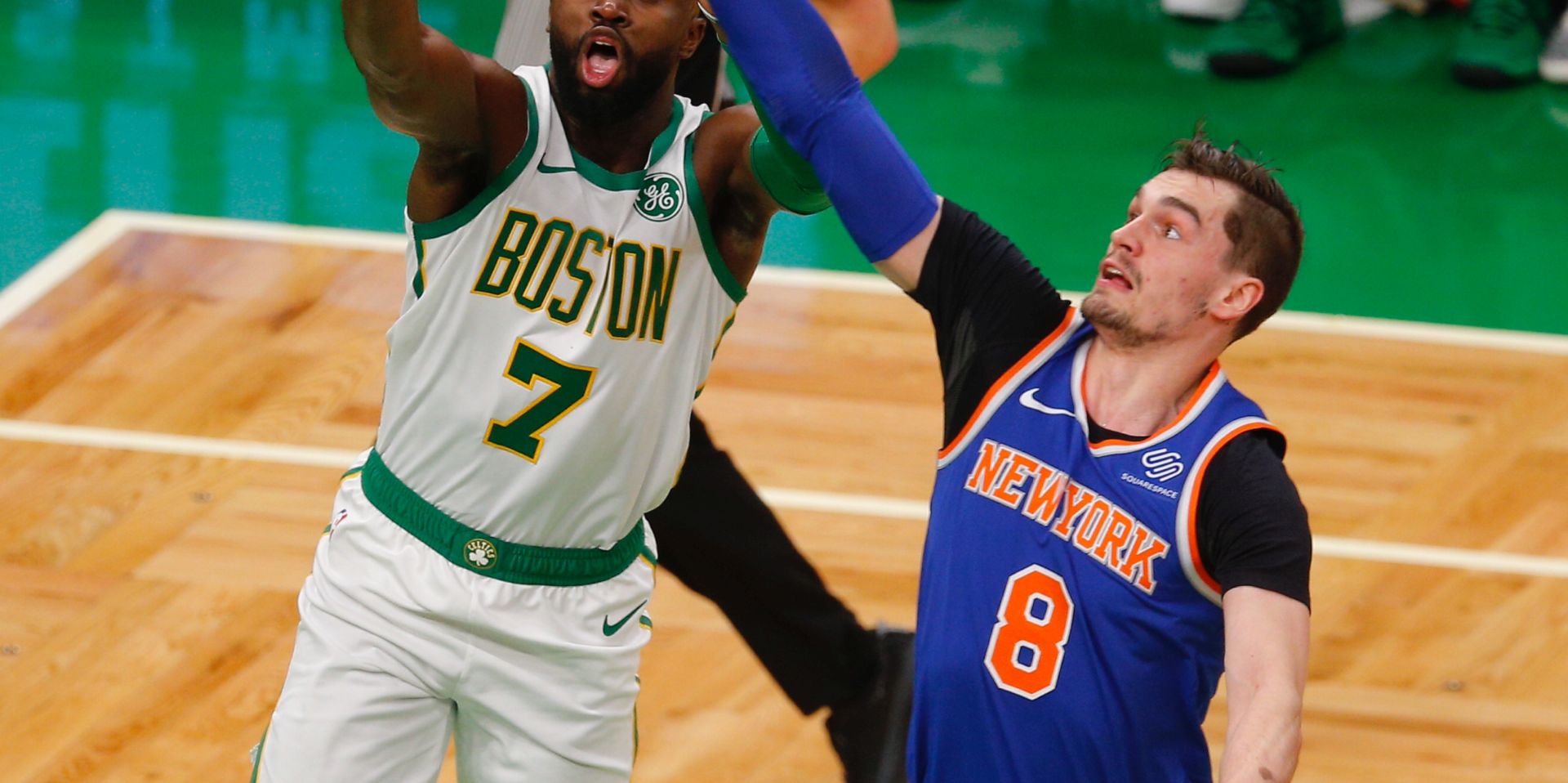 epa07182091 Boston Celtics Jaylen Brown (L) watches as New York Knicks Mario Hezonja (R) of Coatia steals the ball during the first quarter at the TD Garden in Boston, Massachusetts, USA, 21 November 2018.  EPA/CJ GUNTHER  SHUTTERSTOCK OUT