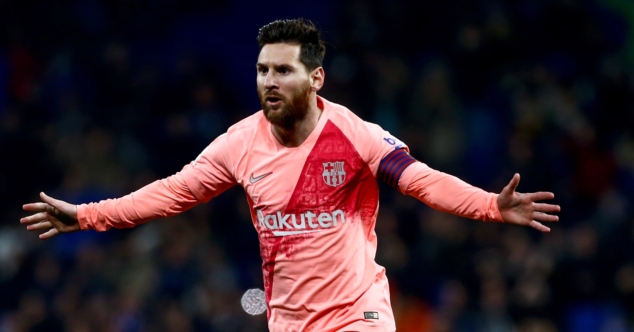epa07218275 FC Barcelona's Lionel Messi celebrates after scoring the 0-1 lead during a Spanish LaLiga soccer match between RCD Espanyol and FC Barcelona at the Cornella-El Prat stadium in Cornella, Catalonia, north eastern Spain, 08 December 2018.  EPA/Quique GarcA­a