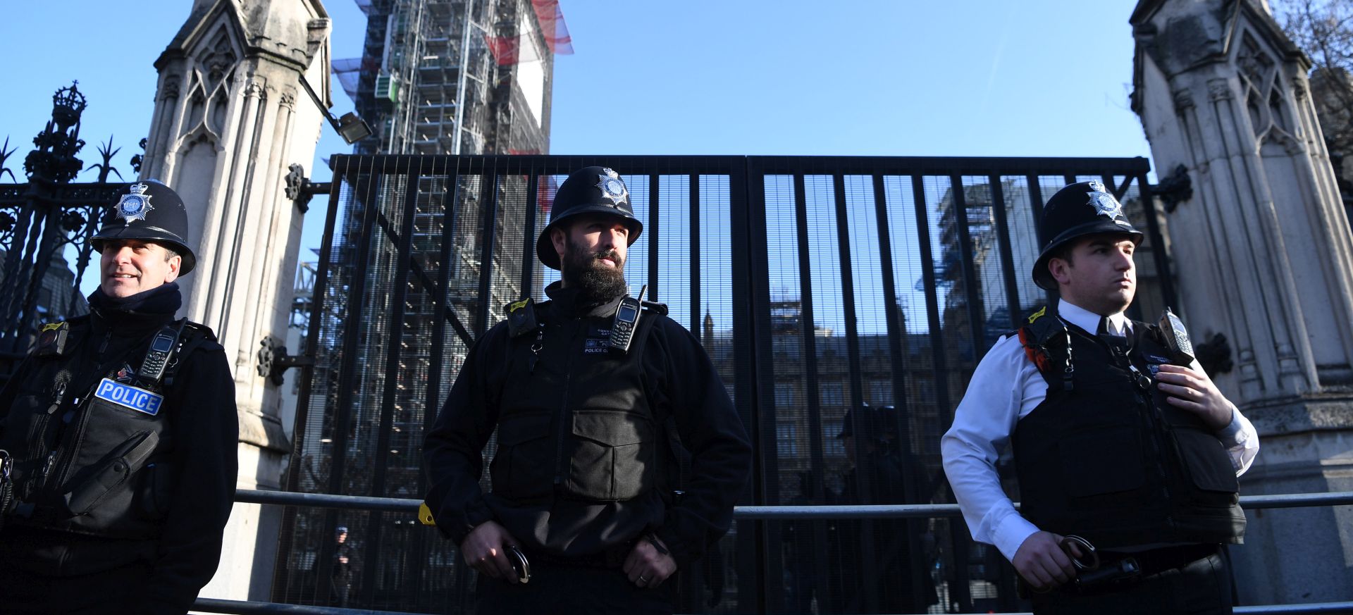 epa07223558 Police officers guard outside carriage gates at the houses of Parliament in London, Britain, 11 December 2018. According to police, a man has been tasered and arrested by armed police officers after he allegedly broke in the grounds of Parliament.  EPA/NEIL HALL