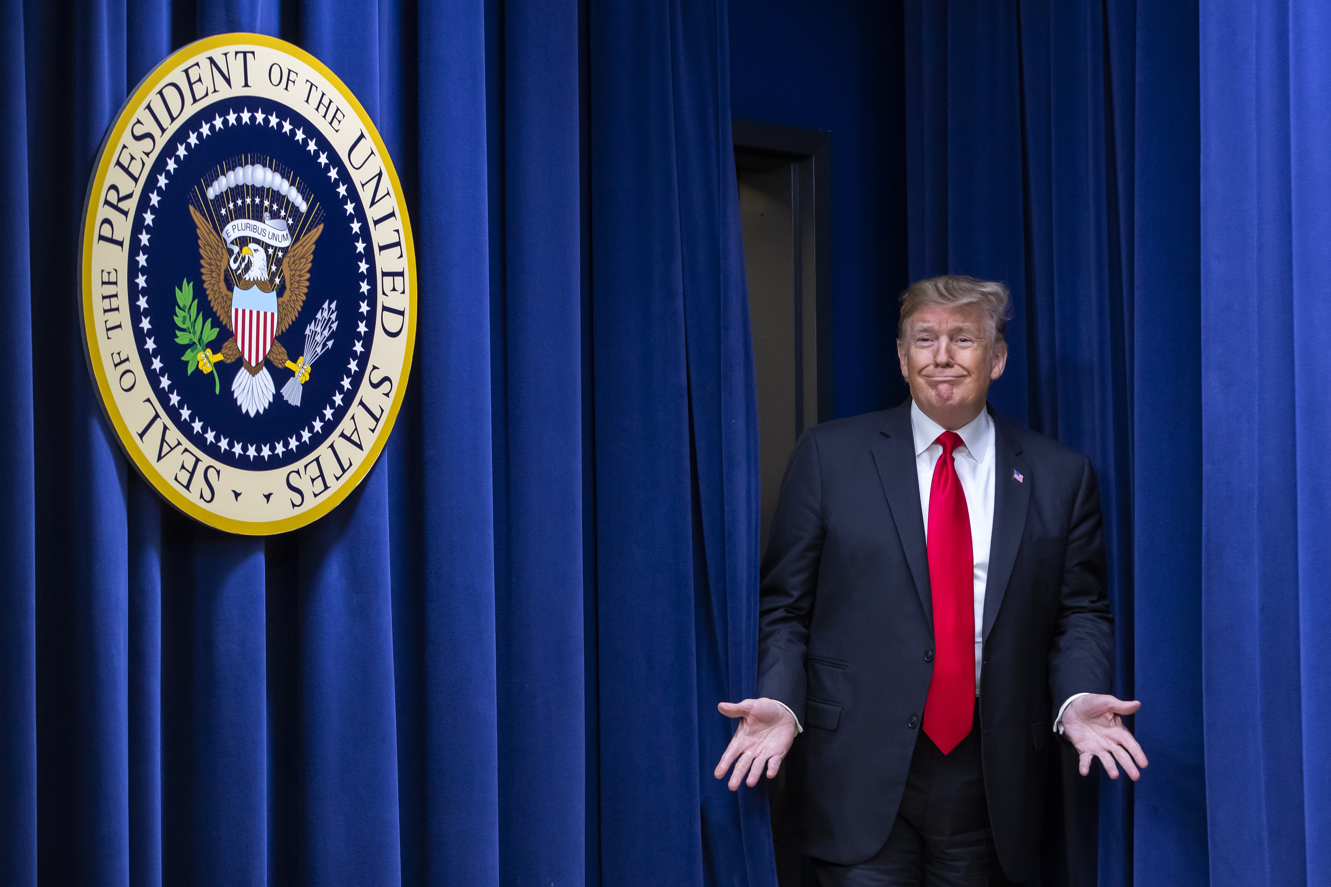 epa07242796 US President Donald J. Trump arrives to sign the Agriculture Improvement Act of 2018 farm bill in the South Court Auditorium of the Eisenhower Executive Office Building on the White House complex grounds in Washington, DC, USA, 20 December 2018. Trump is in a standoff with Congress for the funding of a border wall, with a partial government shutdown looming on 21 December.  EPA/ERIK S. LESSER
