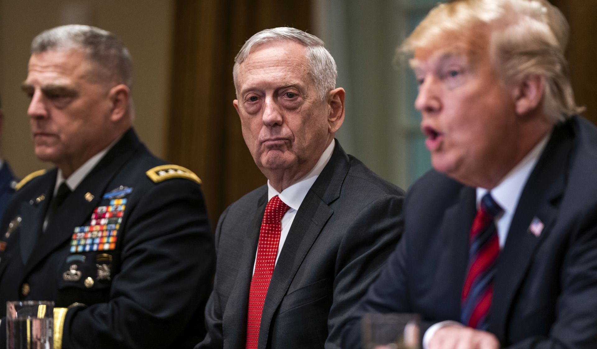epa07242840 (FILE) - US Defense Secretary James Mattis (C) listens to President Donald J. Trump (R) speaking to the media before meeting with senior military advisors in the Cabinet Room of the White House in Washington, DC, USA, 23 October 2018 (re-issued 20 December 2018). Media reports on 20 December 2018 state that US Secretary of Defense James Mattis is retiring at the end of February 2019 citing the announcment from a tweet by US President Donald J. Trump.  EPA/JIM LO SCALZO