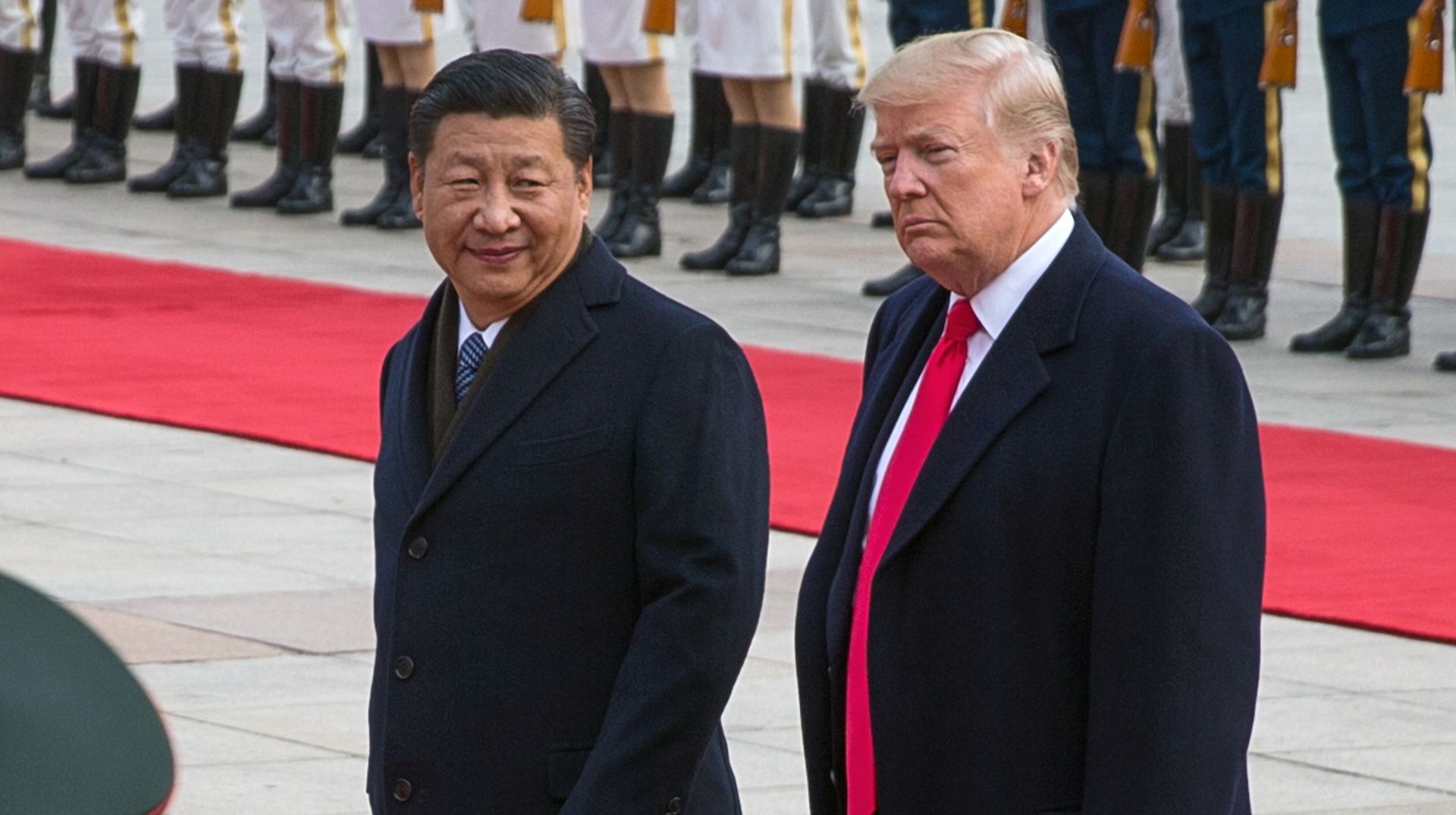 epa07253209 (FILE) - US President Donald J. Trump (R) and Chinese President Xi Jinping (L) review soldiers of the Chinese People's Liberation Army honor guard during a welcome ceremony at the Great Hall of the People in Beijing, China, 09 November 2017 (reissued 29 December 2018). Trump said on Twitter on 29 December 2018 that he had a 'long and very good call' with Chinese President Xi Jinping on a possible trade deal between the United States and China.  EPA/ROMAN PILIPEY