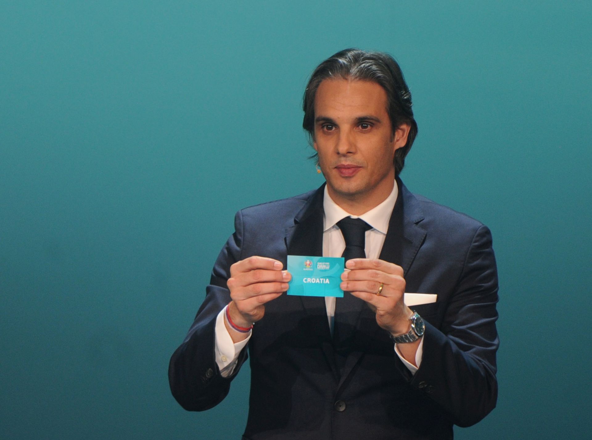 epa07203442 Former Portuguese professional footballer Nuno Gomes shows the lot of Croatia during the UEFA Euro 2020 Qualification Draw in Dublin, Ireland, 02 December 2018.  EPA/AIDAN CRAWLEY