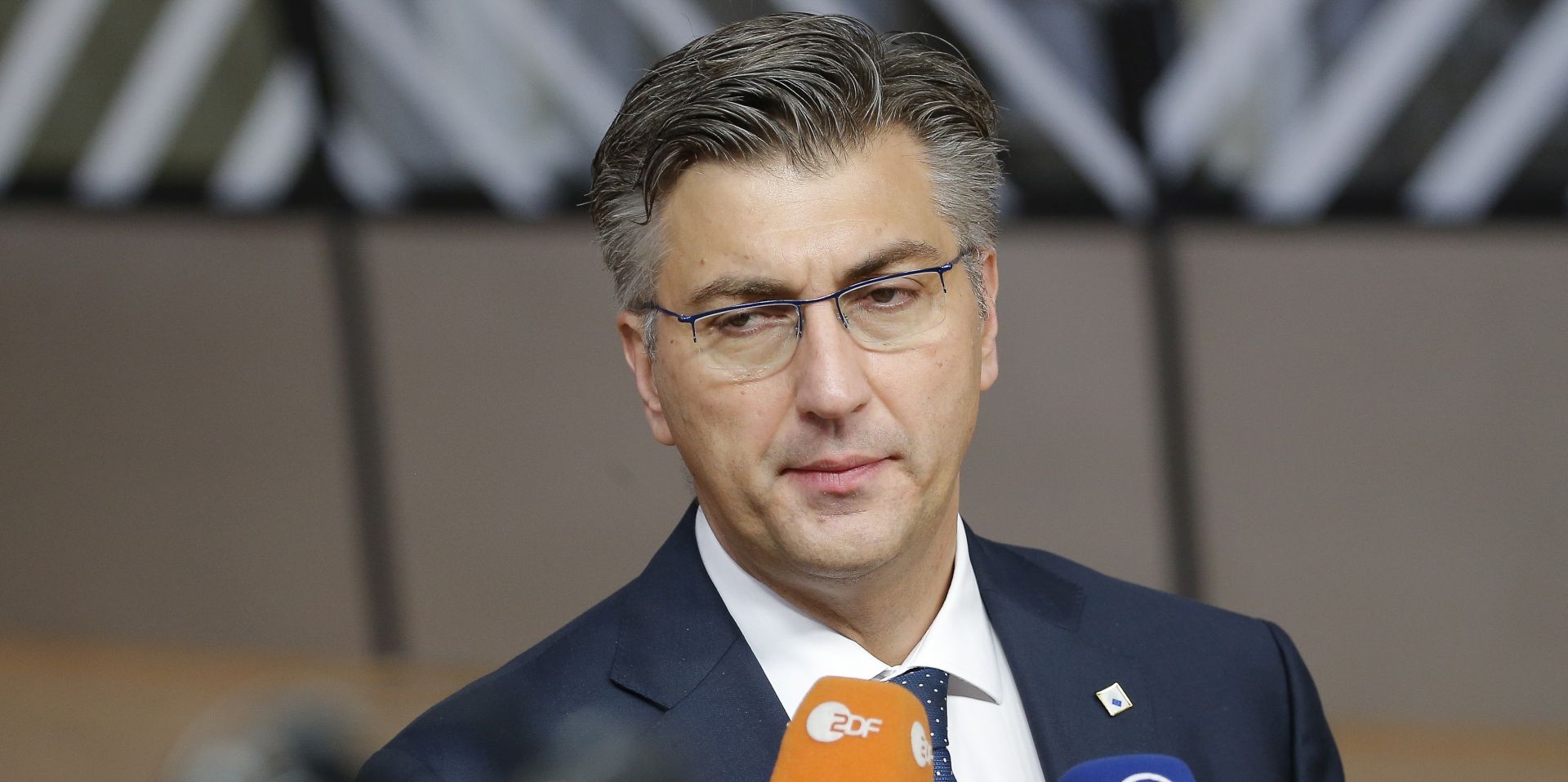 epa07230576 Croatian Prime Minister Andrew Plenkovic speaks to media as he arrives for the European Council in Brussels, Belgium, 14 December 2018. On the second day of the summit EU leader will again focus on the conclusions on the Single Market, climate change, migration, disinformation, the fight against racism and xenophobia, and citizens' consultations.  EPA/JULIEN WARNAND