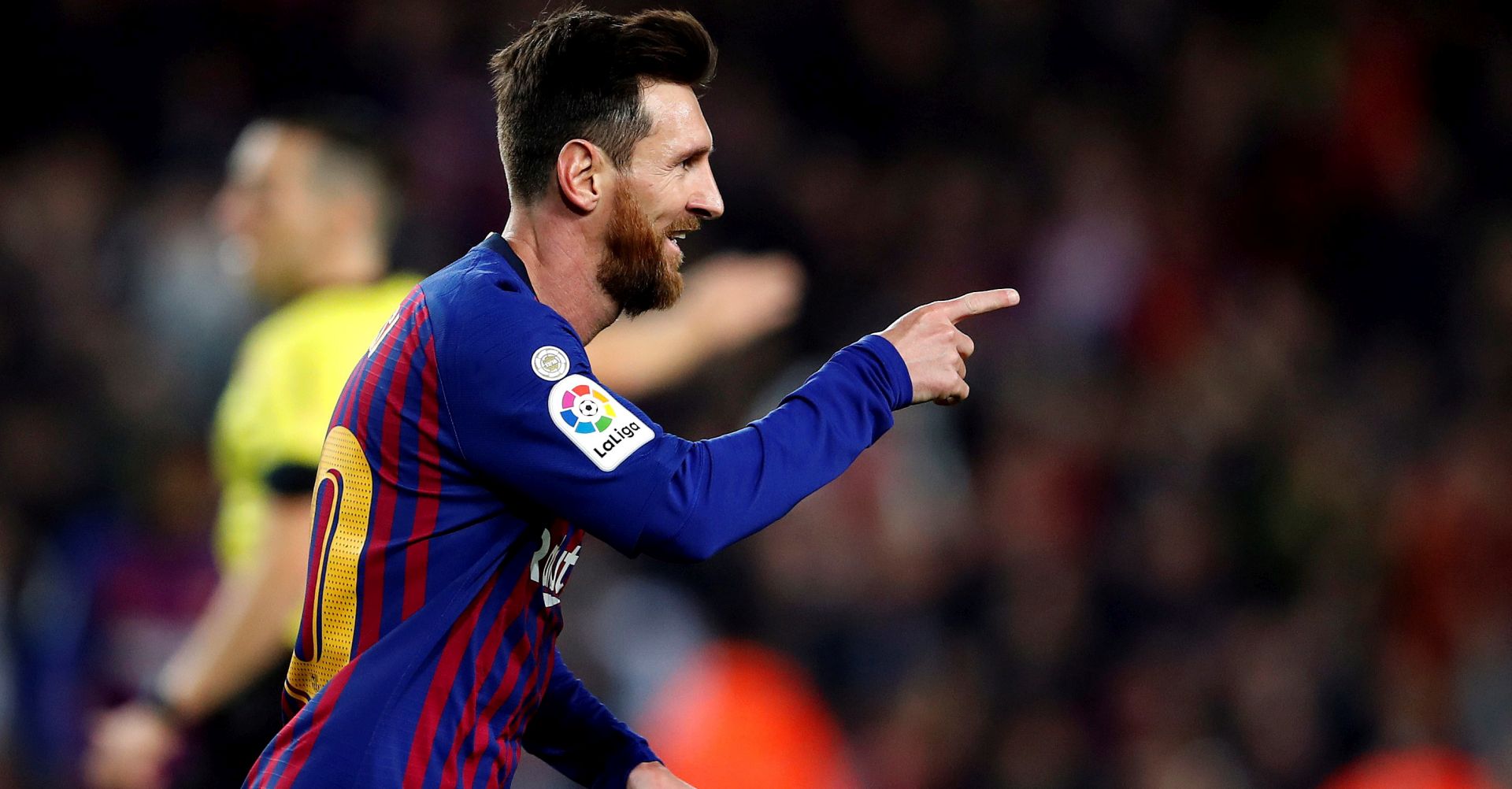 epa07245709 FC Barcelona's Lionel Messi celebrates after scoring against Celta during their Spanish Liga Primera Division soccer match played at Nou Camp stadium in Barcelona, Spain, 22 December 2018.  EPA/Alberto Estevez