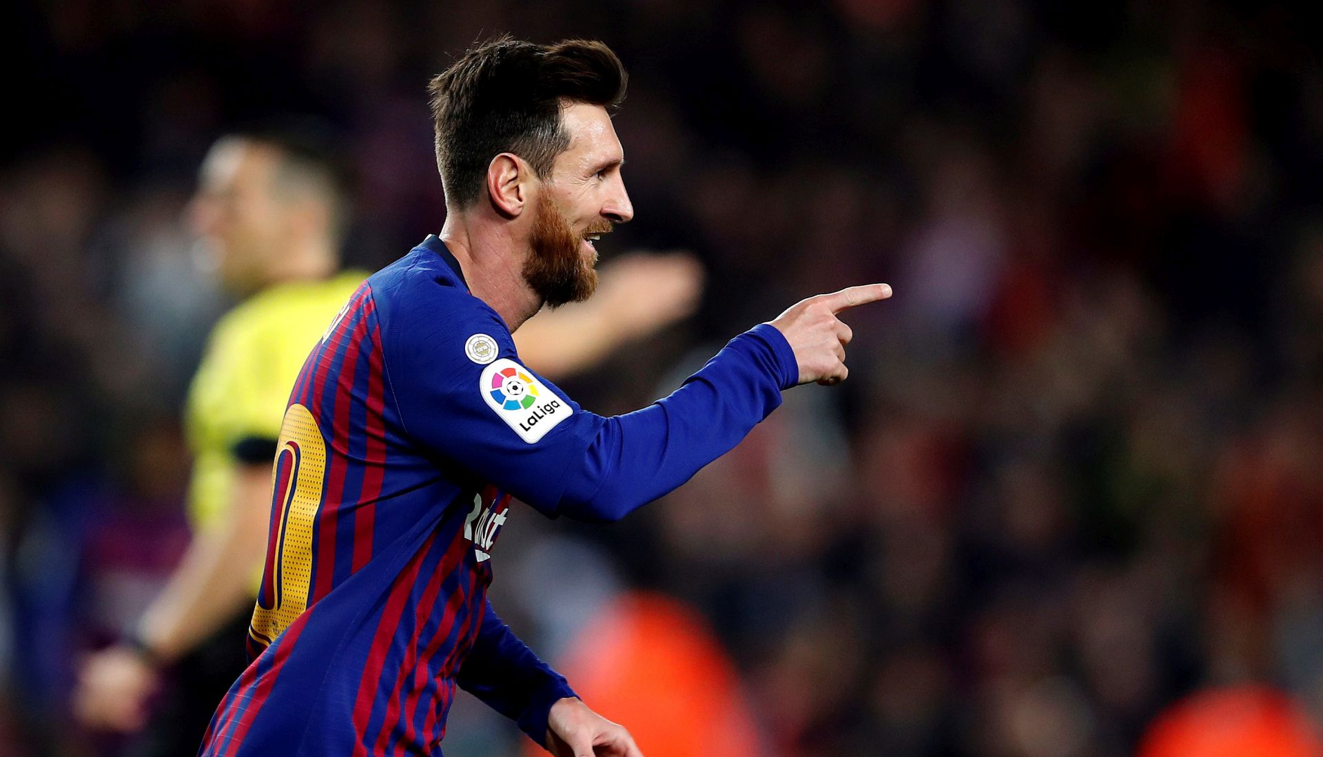 epa07245709 FC Barcelona's Lionel Messi celebrates after scoring against Celta during their Spanish Liga Primera Division soccer match played at Nou Camp stadium in Barcelona, Spain, 22 December 2018.  EPA/Alberto Estevez