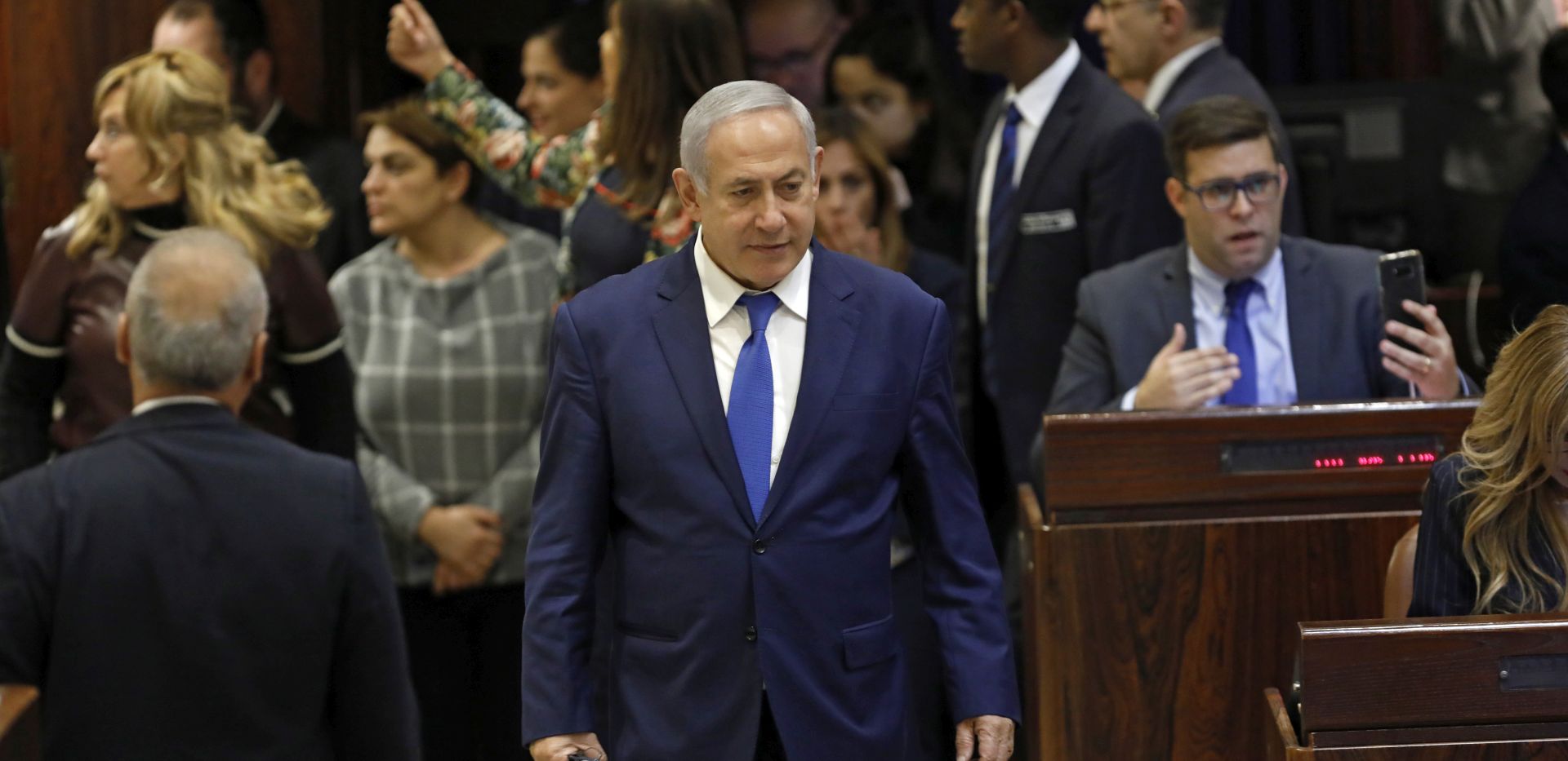 epa07249334 Israeli Prime Minister Benjamin Netanyahu attends a discussion to vote on the dissolution of the Israeli Parliament in the Knesset, in Jerusalem, Israel, 26 December 2018. According to reports, the heads of the coalitions at the Israeli parliament agreed on 24 December to dissolve the Israeli parliament and go to early elections on 09 April 2019.  EPA/ABIR SULTAN