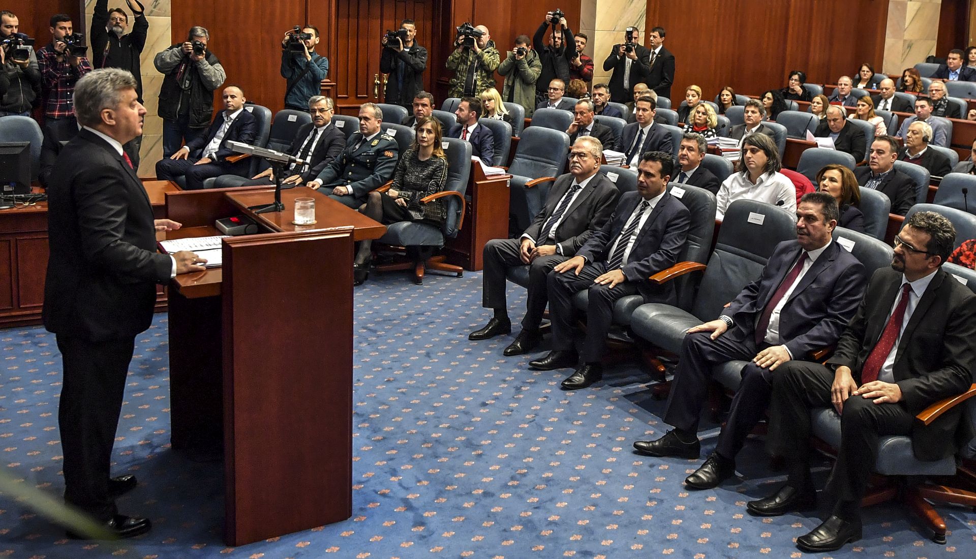 epa07251346 Macedonian president Gjorge Ivanov (L) speaks to the parliament during his regular annual speech in Skopje, the Former Yugoslav Republic of Macedonia, 28 December 2018. In his speech, the president condemned the government's policy. He assessed the agreements with Bulgaria and Greece as harmful to the state.  EPA/GEORGI LICOVSKI