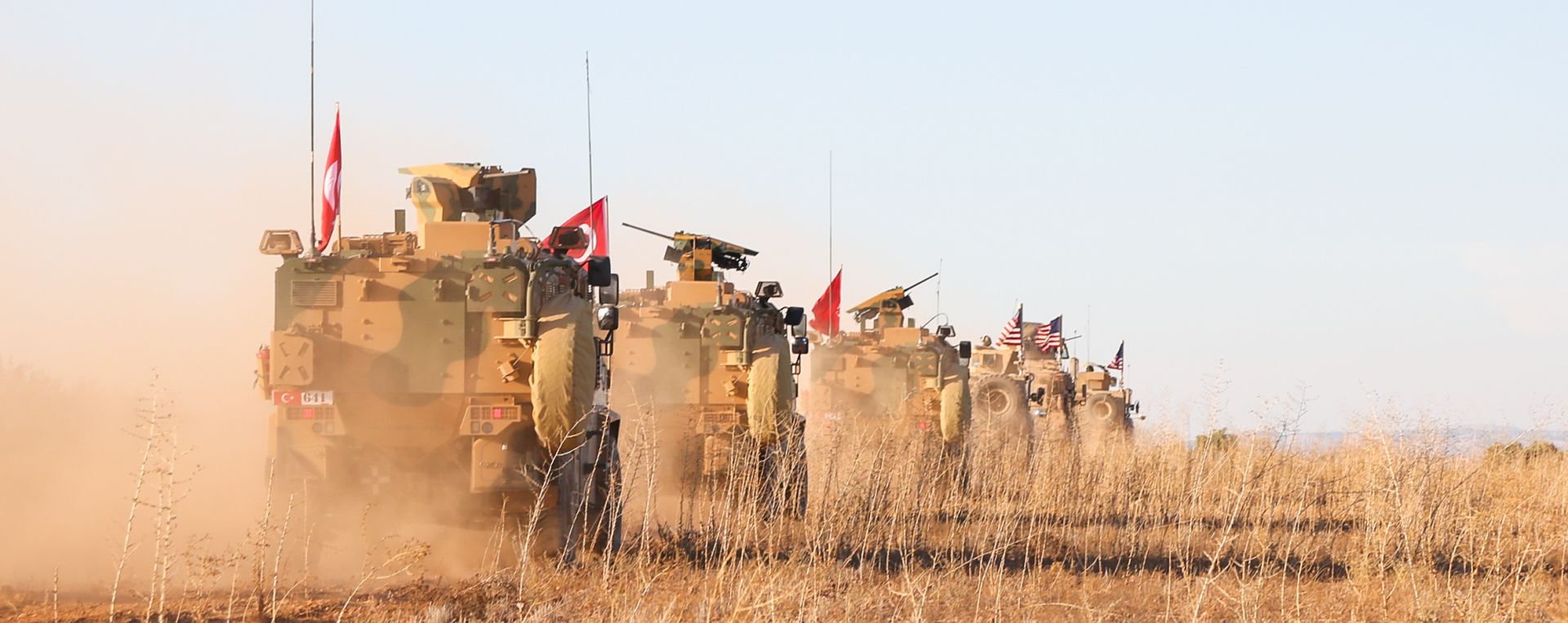 epa07252596 (FILE) - A handout photo made available by the US Army shows US and Turkish soldiers conducting the first-ever combined joint patrol outside Manbij, Syria, 01 November 2018 (reissued 29 December 2018). According to reports on 28 December 2018, The US-backed Kurdish People's Protection Units (YPG) and the Syrian Democratic Forces (SDF), which control a 250km territory in northern Syria, asked Assad's Syrian army to take over control of Manbij town in order to protect it from a potential Turkish attack. On 19 December 2018 US President Donald J. Trump announced the withdrawal of US forces from Syria, and on 24 December 2018 he said that Turkey will be clearing the last of IS pockets in Syria. Turkey classifies the YPG and SDF as terrorist organizations.  EPA/ARNADA JONES / US ARMY HANDOUT Released

CJTF-OIR HANDOUT EDITORIAL USE ONLY/NO SALES