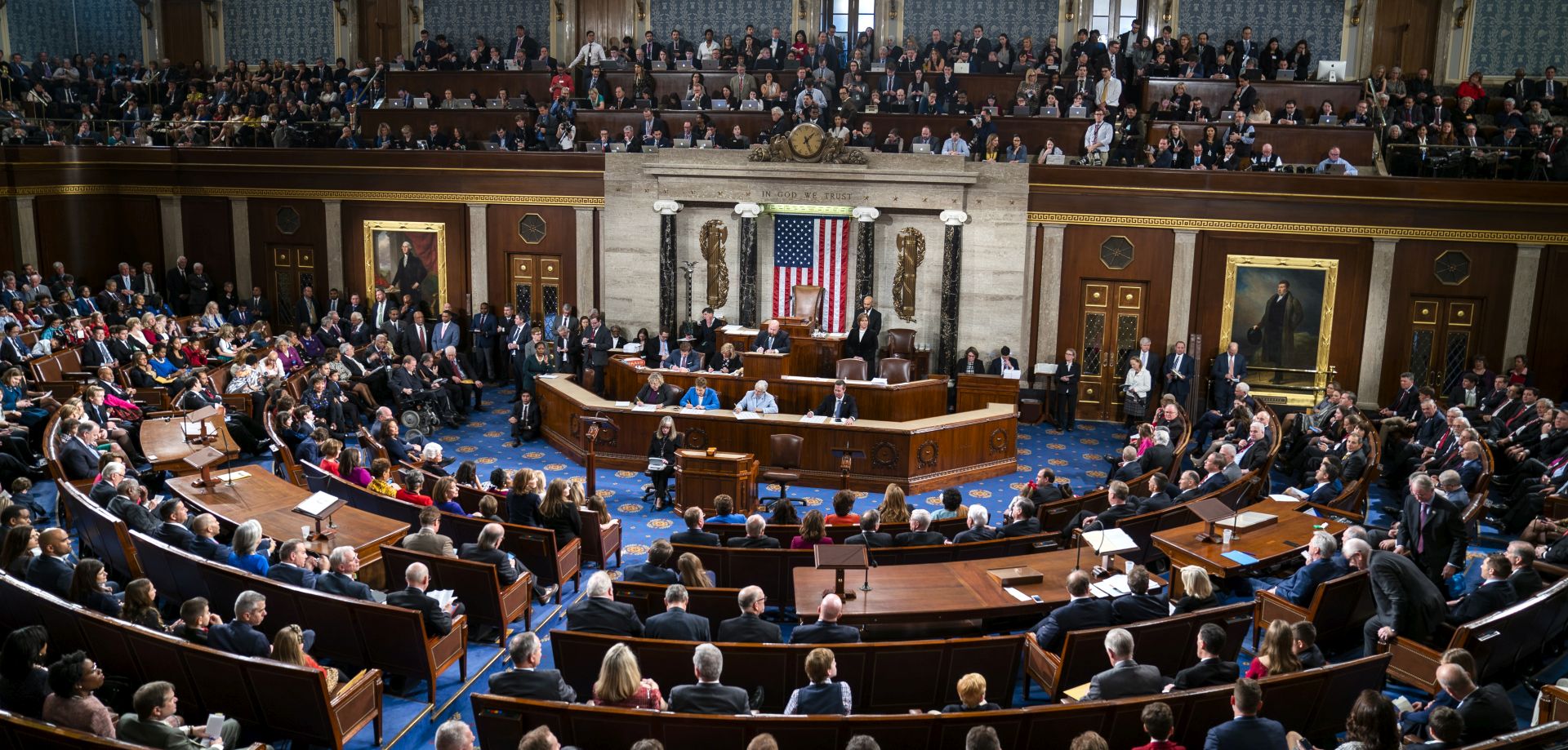 epa07260328 Members of the House of Representatives wait for Democratic House Leader Nancy Pelosi to accept the gavel from Republican Congressman from Alaska and Dean of the House Don Young (R) to once again become Speaker of the House in the US Capitol in Washington, DC, USA, 03 January 2019. Pelosi and the House of Representatives are expected to vote later today on a bill to re-open the government, which is in its 11th day of a partial shutdown.  EPA/JIM LO SCALZO