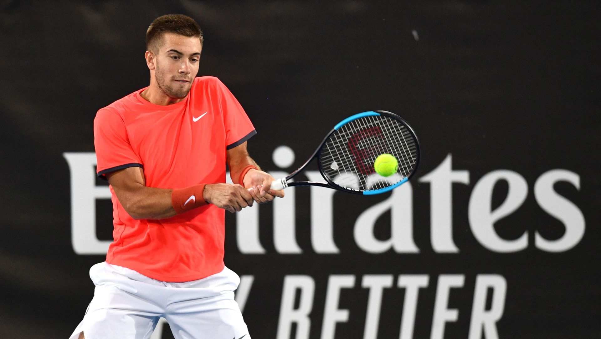 epa07269128 Borna Coric of Croatia in action against Fernando Verdasco of Spain on day two of the World Tennis Challenge at Memorial Drive Park in Adelaide, Australia, 08 January 2019.  EPA/DAVID MARIUZ AUSTRALIA AND NEW ZEALAND OUT