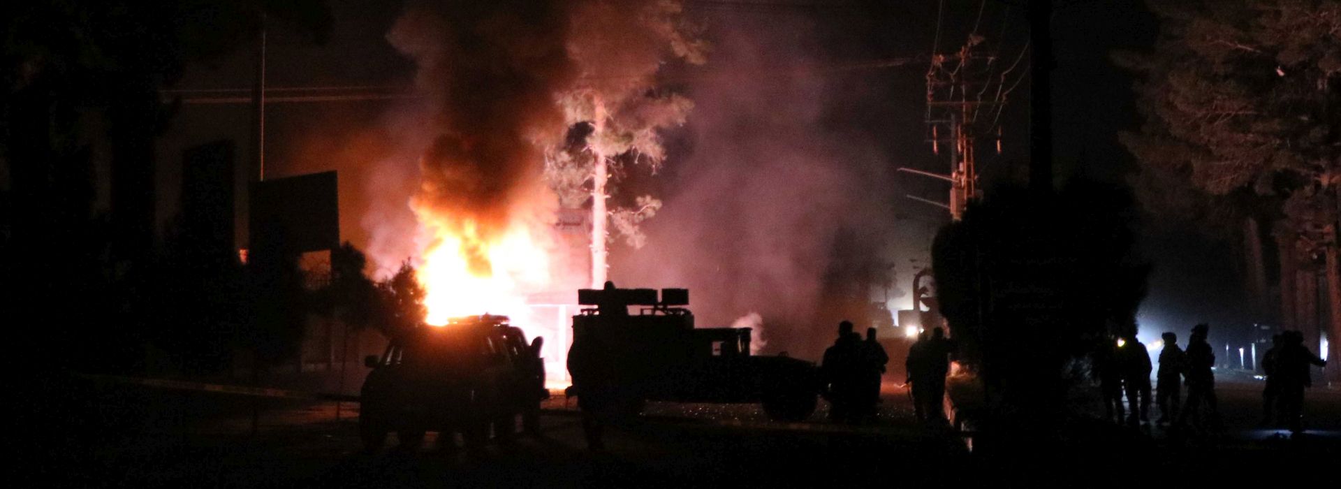 epa07278926 Afghan security officials inspect the scene of a bomb explosion in Herat, Afghanistan, 12 January 2019. At least six peoples inlcuding three Police were killed in the incident.  EPA/JALIL REZAYEE