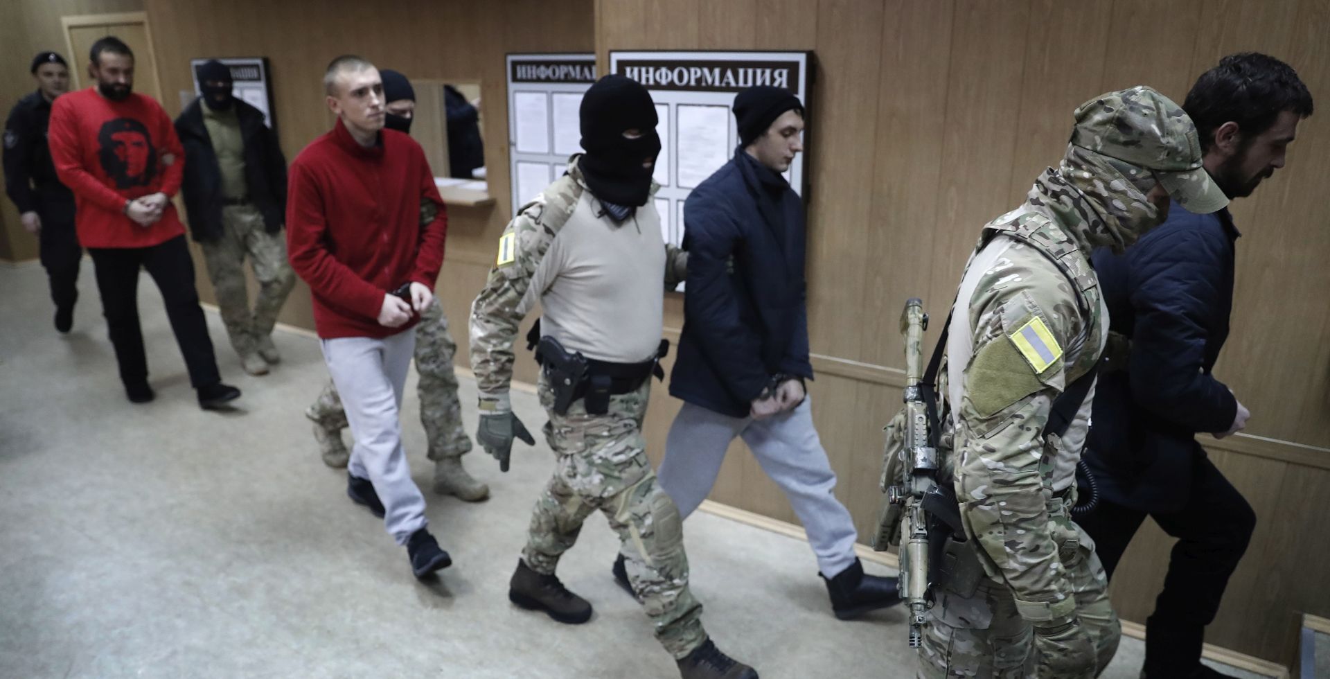 epa07286530 Ukrainian Navy sailors are escorted to attend a hearing at the Lefortovsky district court in Moscow, Russia, 15 January 2019. The court will consider the motions filed by investigators to extend arrest of Ukrainian Navy ships  crew members who were arrested in November 2018 on charges of illegal crossing the Russian border. Two Ukrainian war ships and a tugboat were captured by Russian border guards on 25 November 2018, allegedly violating the Russian sea border while approaching the Kerch Strait from the Black Sea side.  EPA/MAXIM SHIPENKOV