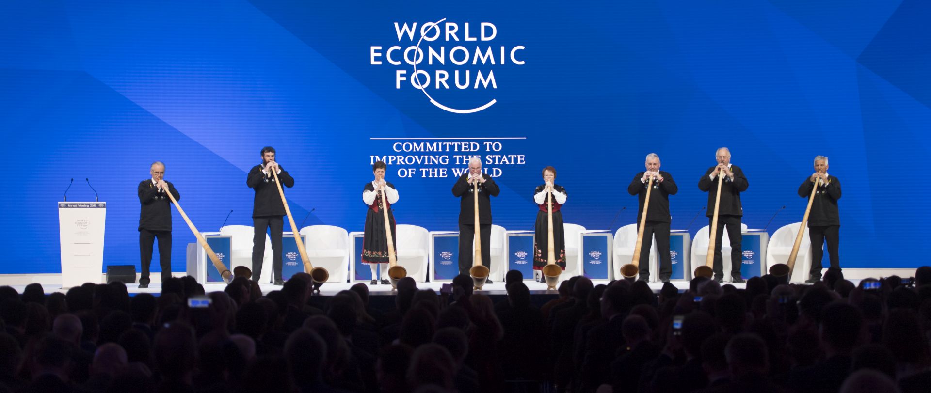 epa07308907 Alphorn players play on stage before the opening session on the first day of the 49th annual meeting of the World Economic Forum (WEF) in Davos, Switzerland, 22 January 2019. The meeting brings together entrepreneurs, scientists, corporate and political leaders in Davos under the topic 'Globalization 4.0' from 22 to 25 January 2019.  EPA/LAURENT GILLIERON