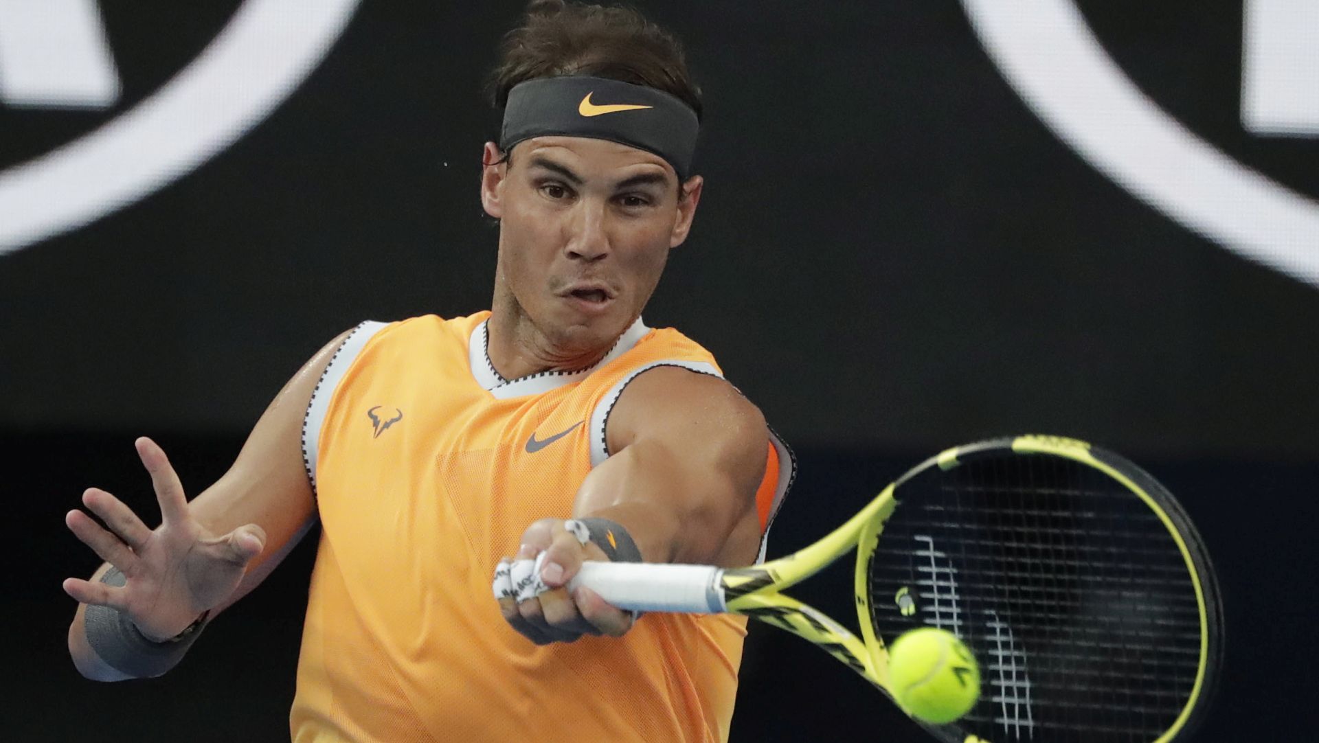 epa07314574 Rafael Nadal of Spain in action during his men's singles semifinal match againstStefanos Tsitsipas of Greece at the Australian Open Grand Slam tennis tournament in Melbourne, Australia, 24 January 2019.  EPA/MAST IRHAM