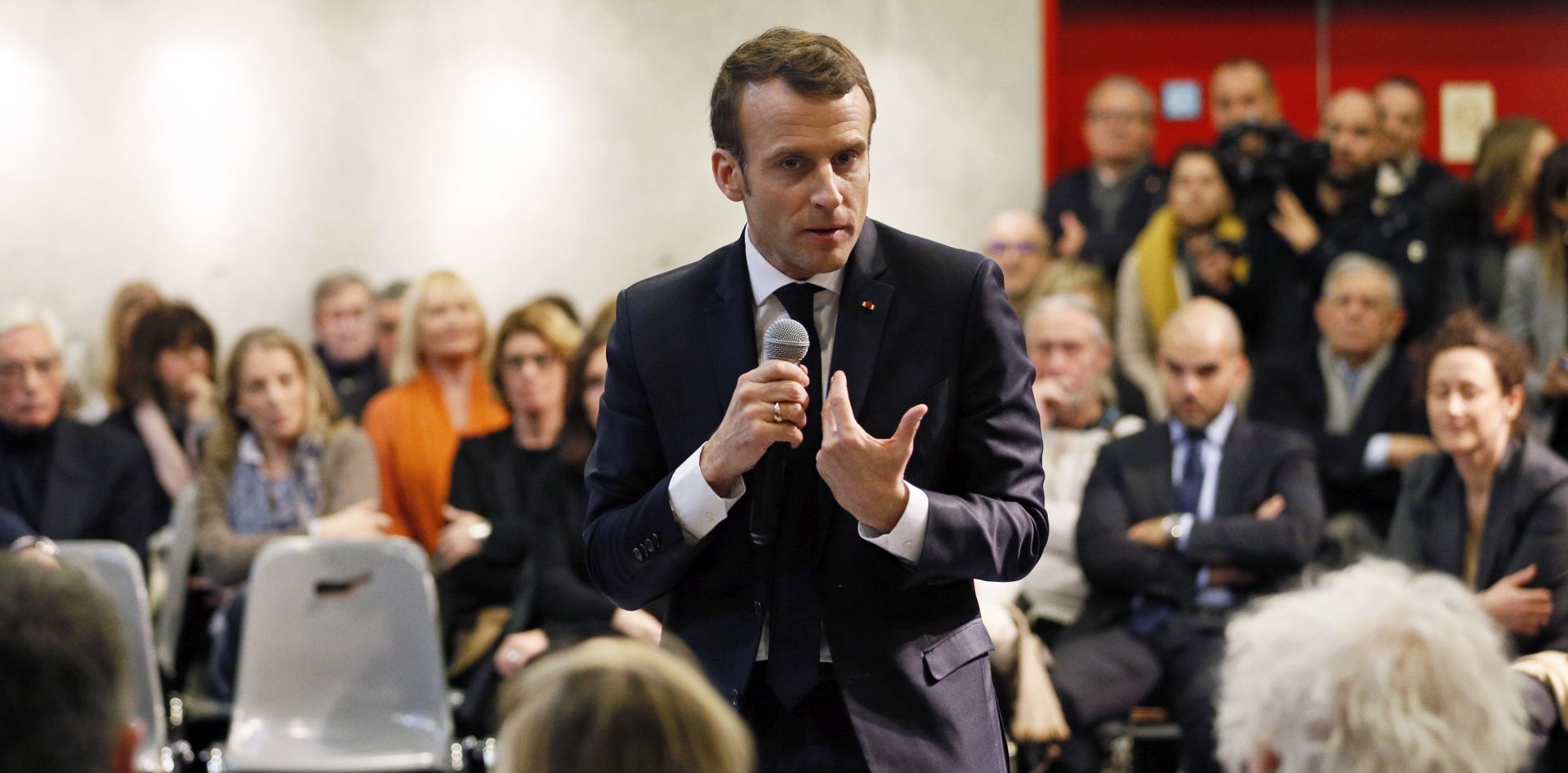 epa07316289 French President Emmanuel Macron speaks at a meeting with local residents as part of the 'Great National Debate' in Bourg-de-Peage near Valence, France, January 24, 2019. Macron visits the region as part of the 'Great National Debate' designed to find ways to calm social unrest in the country.  EPA/EMMANUEL FOUDROT / POOL MAXPPP OUT