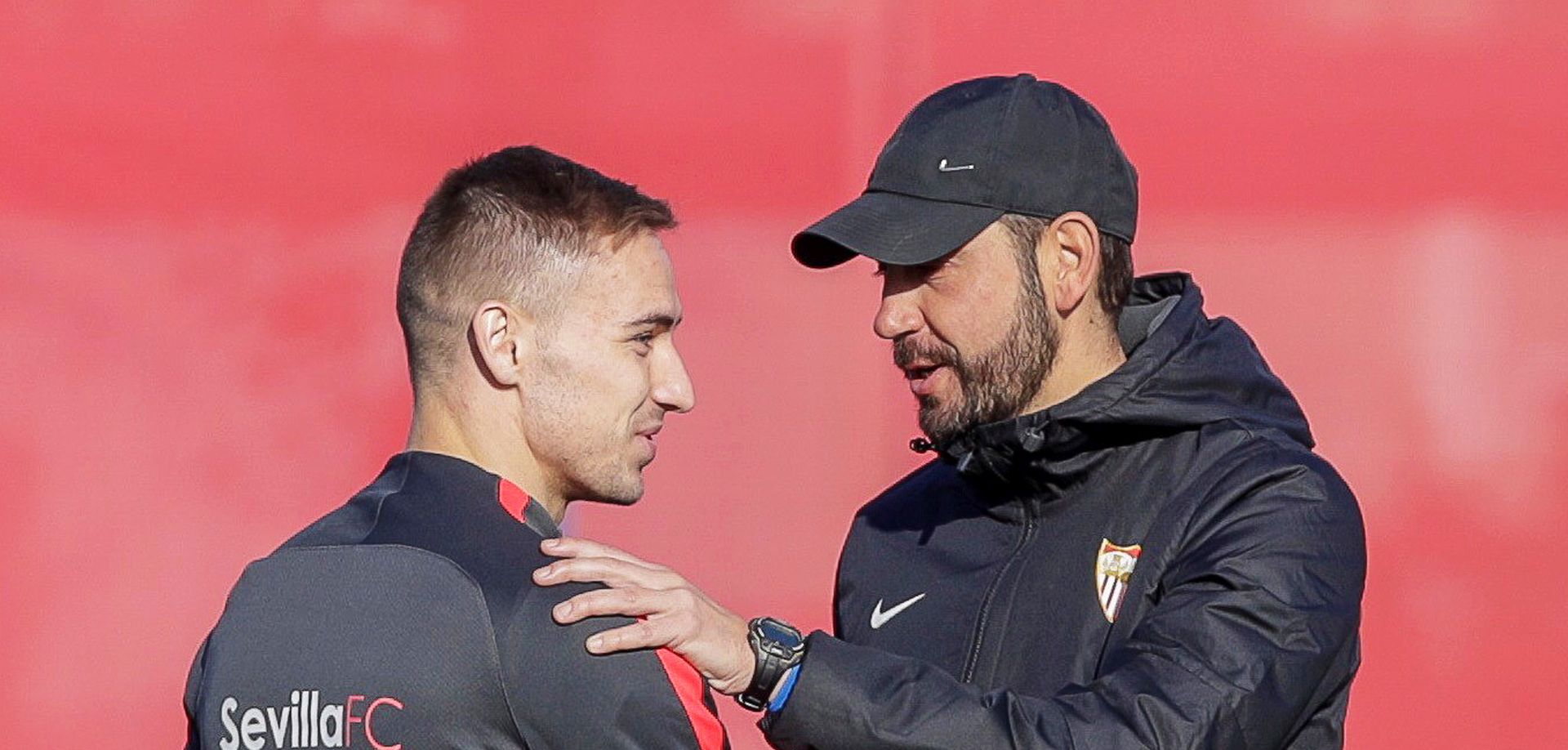 epa07329379 Sevilla's head coach Pablo Machin (R) greets his new Croatian midfielder Marko Rog (L) during their team's training session in Seville, Spain, 29 January 2019. Rog joined Spanish La Liga soccer club Sevilla FC on loan from Italian Serie A side SSC Napoli until the end of the current season. Sevilla FC will face FC Barcelona in their Spanish King's Cup quarter final, second leg soccer match on 30 January 2019.  EPA/JULIO MUNOZ
