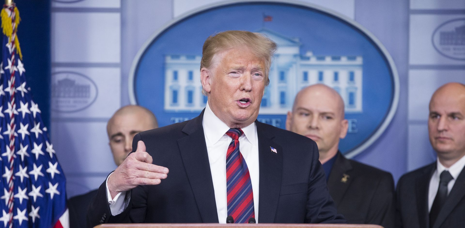 epa07260623 US President Donald J. Trump (C) delivers a statement on border security and the ongoing partial shutdown of the federal government, with members of the National Border Patrol Council, in the James Brady Press Briefing Room of the White House in Washington, DC, USA, 03 January 2019. A partial shutdown of the government began when Congress and Trump failed to strike a deal before a 22 December 2018 deadine, due to differences regarding border security.  EPA/MICHAEL REYNOLDS