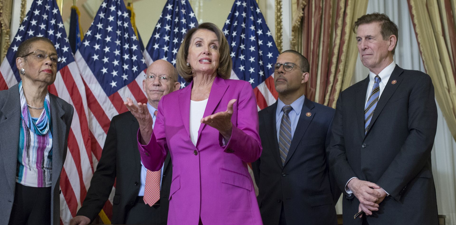 epa07276372 US Speaker of the House Democrat Nancy Pelosi (C) delivers remarks beside Democratic lawmakers while participating in an enrollment ceremony for legislation that will ensure backpay to furloughed federal employees, on Capitol Hill in Washington, DC, USA, 11 January 2019. The legislation passed in the Senate and House and will be sent next to the White House for US President Donald J. Trump's signature. The current partial shutdown of the US federal government is on track to become the longest in US history, on 12 January, surpassing the previous 21-day shutdown of 1995-1996.  EPA/MICHAEL REYNOLDS