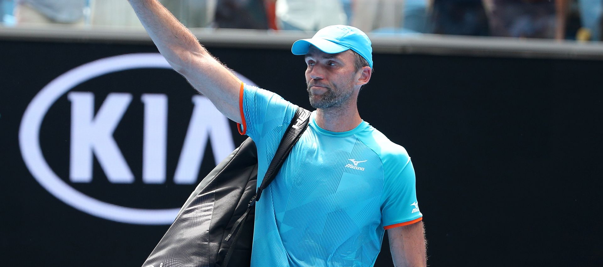epa07291531 Ivo Karlovic of Croatia waves as he leaves the court after being defeated by Kei Nishikori of Japan during their second round match on day four of the Australian Open tennis tournament in Melbourne, Australia, 17 January 2019.  EPA/HAMISH BLAIR  AUSTRALIA AND NEW ZEALAND OUT