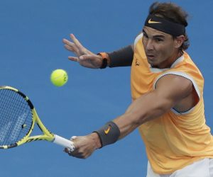epa07323589 Rafael Nadal of Spain in action during his men's singles final match against Novak Djokovic of Serbia at the Australian Open Grand Slam tennis tournament in Melbourne, Australia, 27 January 2019.  EPA/LYNN BO BO