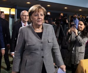 epa07334388 (L-R) Premier of Saarland Tobias Hans, First Mayor of Hamburg and head of the new state government Peter Tschentscher and German Chancellor Angela Merkel arrives for a press briefing after a meeting with the heads of state and government at the Chancellery in Berlin, Germany, 31 January 2019.  EPA/HAYOUNG JEON