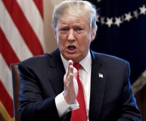 epa07336898 US President Donald J. Trump gestures during a meeting to discuss fighting human trafficking on the southern border in the Cabinet Room of the White House in Washington, DC, USA, 01 February 2019.  EPA/OLIVIER DOULIERY