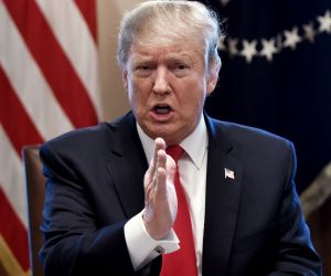 epa07336898 US President Donald J. Trump gestures during a meeting to discuss fighting human trafficking on the southern border in the Cabinet Room of the White House in Washington, DC, USA, 01 February 2019.  EPA/OLIVIER DOULIERY