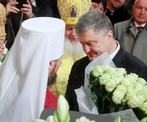 epa07340345 Ukrainian President Petro Poroshenko (R) greets the Metropolitan Epifaniy, the head of the Ukrainian Orthodox Church, during the ceremony of his enthronization in the St. Sophia Cathedral in Kiev, Ukraine, 03 February 2019. Bishop of the Ukrainian Orthodox Church of the Kyiv Patriarchate, Metropolitan of Pereiaslav and Bila Tserkva Epifaniy (Serhiy Dumenko) has been elected as Metropolitan Epiphanius of Kiev and All Ukraine, the head of the Ukrainian Orthodox Church in Ukraine at the unification council of the Ukrainian Orthodox churches on 15 December 2018.  EPA/SERGEY DOLZHENKO