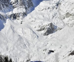 epa07342657 Recovery operations underway for the bodies of three free riders killed in an avalanche in Val Veny, identified as two British and a French, near the Alpine resort of Courmayeur, northwest Italy, 04 February 2019. The bodies of three people were found under an avalanche in the Canale degli Spagnoli, in Val Veny. Two British and two French skiers were reported missing on 03 February afternoon as high risk for avalanches was reported in the area. Searchers were said to be looking for the missing fourth skier.  EPA/THIERRY PRONESTI