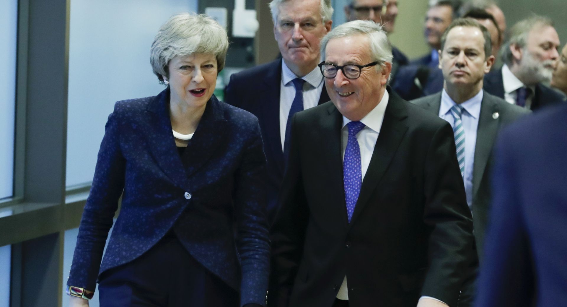 epa07349629 British Prime Minister Theresa May (L) walks together with European commission President Jean-Claude Juncker (R) to a meeting on Brexit in Brussels, Belgium, 07 February 2019. May is in Brussels to discuss Brexit and related issues.  EPA/STEPHANIE LECOCQ