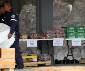 epa07352999 Authorities organize the shipment with humanitarian aid for Venezuela in a collection center located at the international bridge of Tienditas, in Cucuta, Colombia, 08 February 2019. The first trucks with humanitarian aid arrived the previous day to Cucuta, where officials work on logistics for its delivery.  EPA/MAURICIO DUENAS CASTADENAS