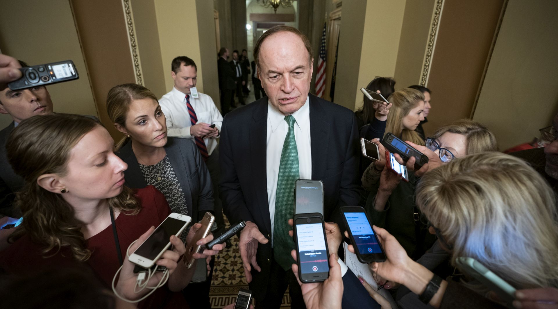 epa07363228 Reporters follow Republican Senator from Alabama Richard Shelby (C) after he joined other appropriators for border security talks inside the US Capitol in Washington, DC, USA, 11 February 2019. The likelihood of another congressional shutdown increased over the weekend when negotiations over the border wall stalled.  EPA/JIM LO SCALZO