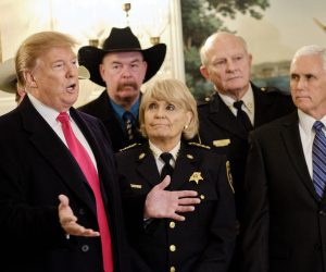 epa07363174 US President Donald J. Trump (L), with US Vice President Mike Pence (R), speaks to the press after meeting with sheriffs from across the country before departing for a rally in Texas, in the Diplomatic Reception Room at the White House in Washington, DC, USA, on 11 February 2019.  EPA/T.J. Kirkpatrick / Bloomberg POOL