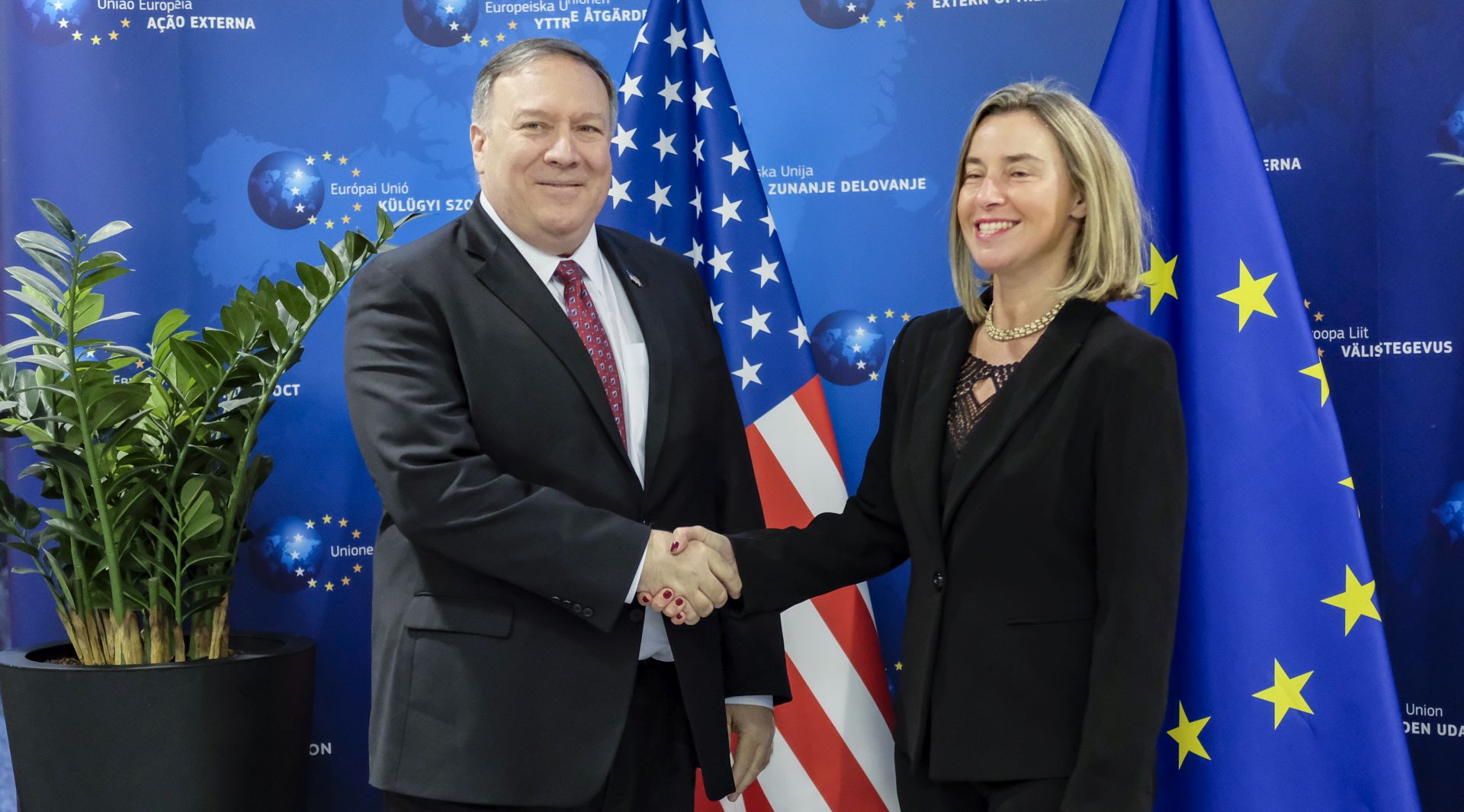 epa07371424 US Secretary of State Mike Pompeo (L) is welcomed by European Union foreign policy chief Federica Mogherini ahead of their meeting in Brussels, Belgium, 15 February 2019.  EPA/OLIVIER HOSLET