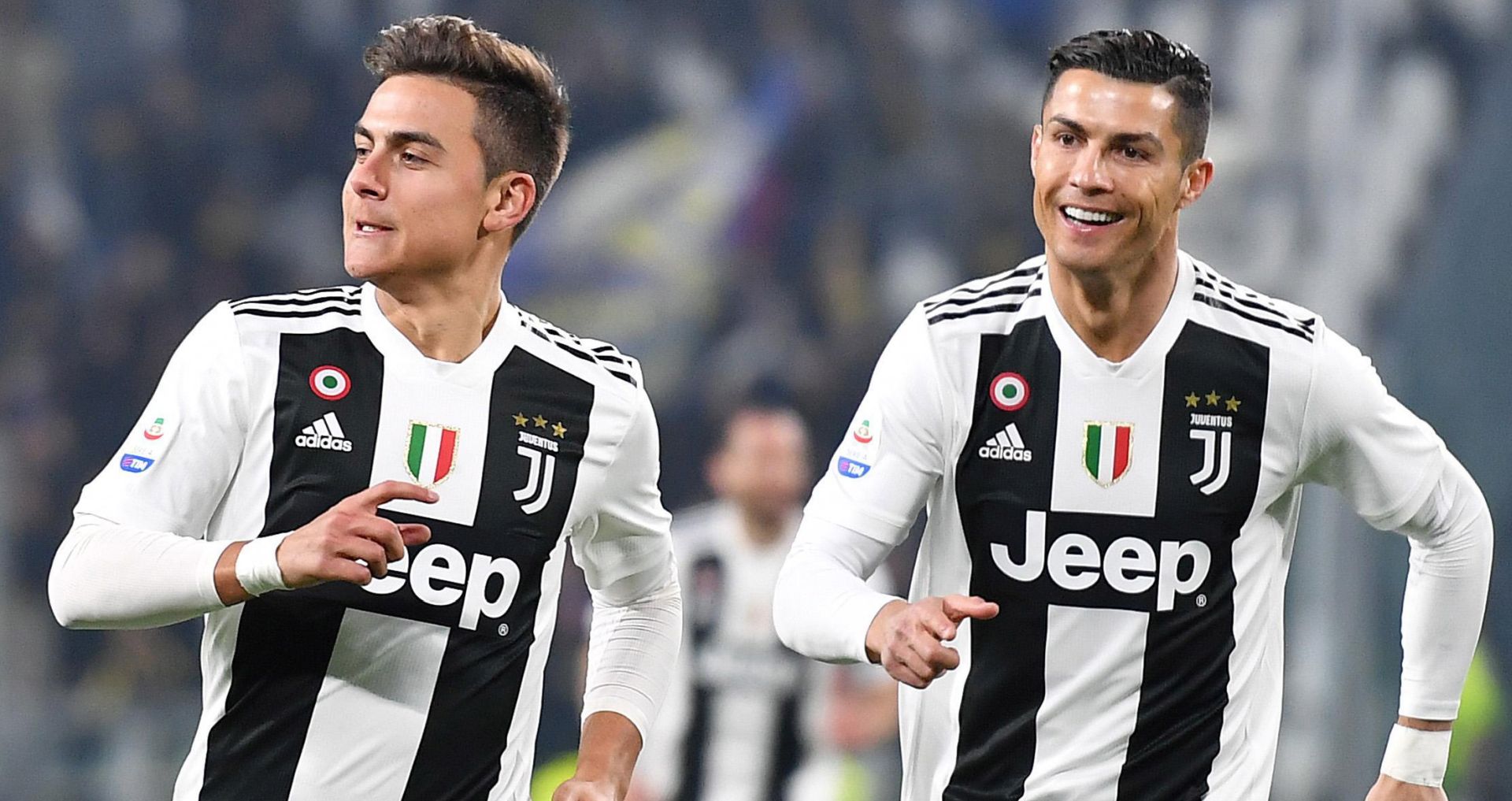 epa07373454 Juventus's forward Paulo Dybala (L) jubilates with his teammate Cristiano Ronaldo after scoring the 1-0 lead during the Italian Serie A soccer match Juventus FC vs Frosinone at the Allianz stadium in Turin, Italy, 15 February 2019.  EPA/ALESSANDRO DI MARCO