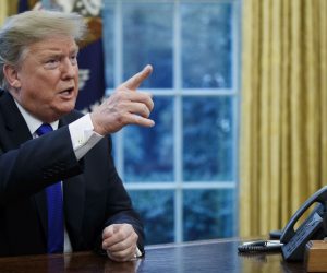 epa07388903 US President Donald J. Trump responds to a question from the news media during a meeting in the Oval Office of the White House in Washington, DC, USA, 22 January 2019. The US and China are aiming to ease the current trade war and the tit for tat tariffs that are unnerving the global economy.  EPA/SHAWN THEW