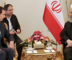 epa07397301 A handout photo made available by the presidential office shows Iranian President Hassan Rouhani receiving his Syrian counterpart Bashar Assad in Tehran, Iran, 25 February 2019. Assad arrived in Tehran on an announced visit, where he met with the Supreme Leader Ayatollah Ali Khamenei and President Hassan Rouhani.  EPA/PRESIDENT OFFICE HANDOUT  HANDOUT EDITORIAL USE ONLY/NO SALES