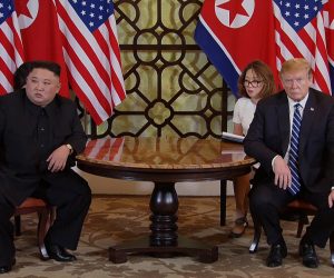 epa07402871 A video grab shows US President Donald J. Trump (R) and North Korean leader Kim Jong-un (L) during the start of their second one on one meeting at the US-North Korea summit in the Sofitel Legend Metropole hotel in Hanoi, Vietnam, 28 February 2019. The second meeting of the US President and the North Korean leader, running from 27 to 28 February 2019, focuses on furthering steps towards achieving peace and complete denuclearization of the Korean peninsula.  EPA/HOST BROADCAST / POOL