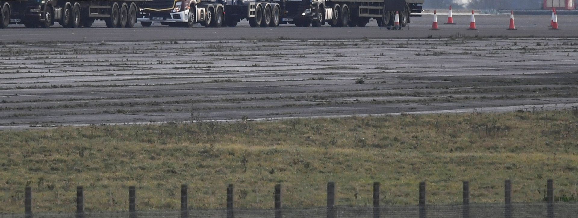 FILE PHOTO: Lorries are seen queue at the Manston Airport waiting to do a test drive to the Port of Dover during a trial of how road will cope in case of a "no-deal" Brexit, Kent FILE PHOTO: Lorries are seen queue at the Manston Airport waiting to do a test drive to the Port of Dover during a trial of how road will cope in case of a "no-deal" Brexit, Kent, Britain January 7, 2019. REUTERS/Toby Melville/File Photo Toby Melville