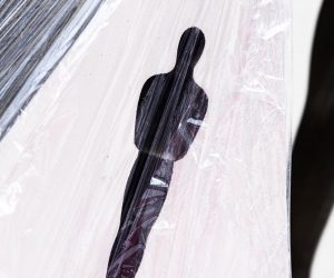 epa07383982 A wrapped 'Oscar' silhouette is displayed in the red carpet area as the preparations for the 91st annual Academy Awards ceremony get underway in Hollywood, California, USA, 20 February 2019. The Oscars are presented for outstanding individual or collective efforts in 24 categories in filmmaking.  EPA/ETIENNE LAURENT *** Local Caption *** 54174449