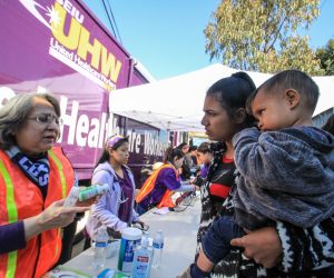 epa07391660 People of a migrant caravan are assisted by American doctors at the Youth Movement 2000 shelter in the city of Tijuana, Mexico, 23 February 2019. About one hundred doctors and more than fifty nurses arrived in Tijuana this afternoon from Los Angeles, California, with the aim of attending free of charge to the health issues faced by migrants of all nationalities who are in the city.  EPA/Joebeth Terriquez
