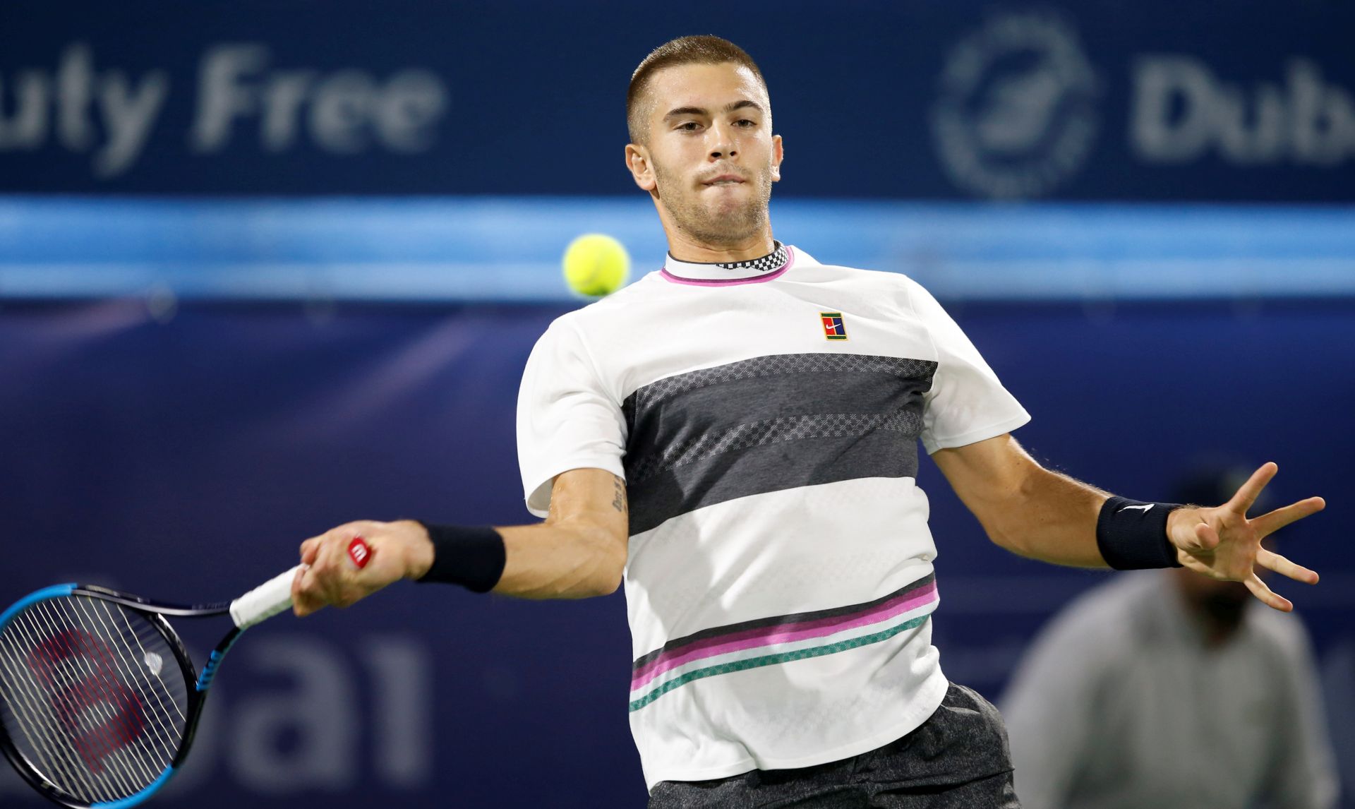 epa07404977 Borna Coric of Croatia in action during his quarter final match against Nikoloz Basilashvili of Georgia at Dubai Duty Free Tennis ATP Championships 2019 in Dubai, United Arab Emirates, 28 February 2019.  EPA/ALI HAIDER